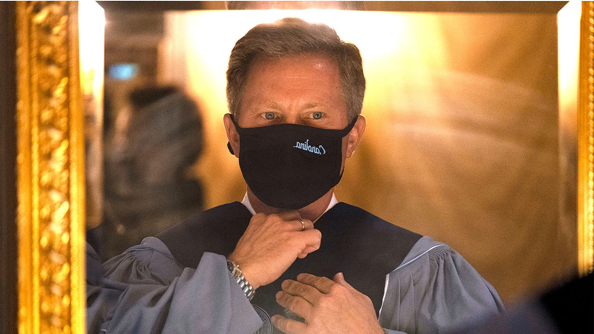 Kevin M. Guskiewicz prepares for his one-of-a-kind installation as the 12th Chancellor of the University of North Carolina at Chapel Hill during a ceremony held at Memorial Hall on Oct. 11, 2020. (Jon Gardiner/UNC-Chapel Hill).